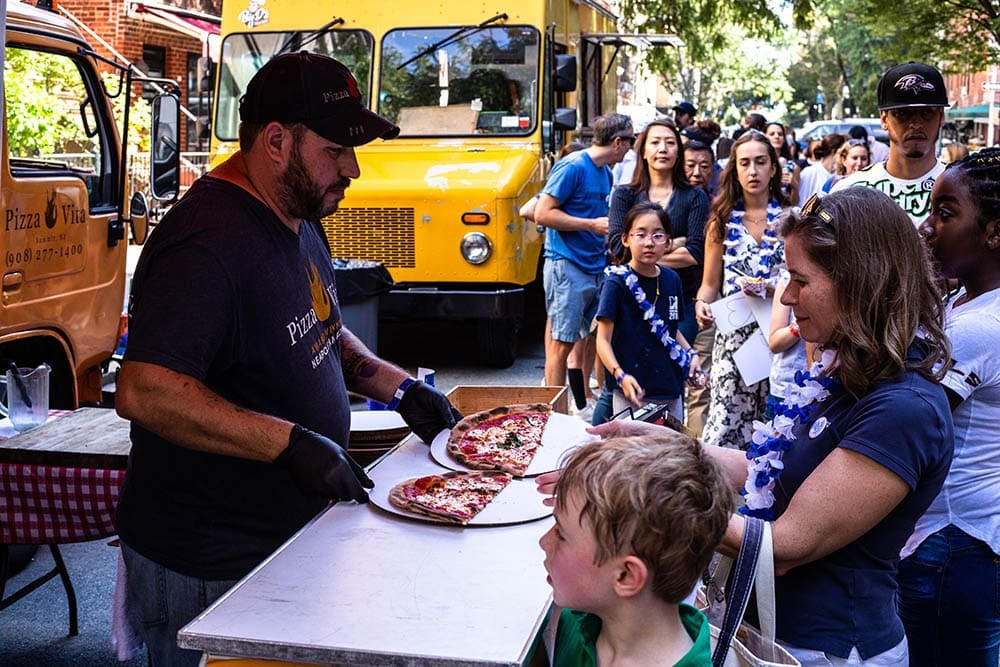 pizza being served with food truck catering