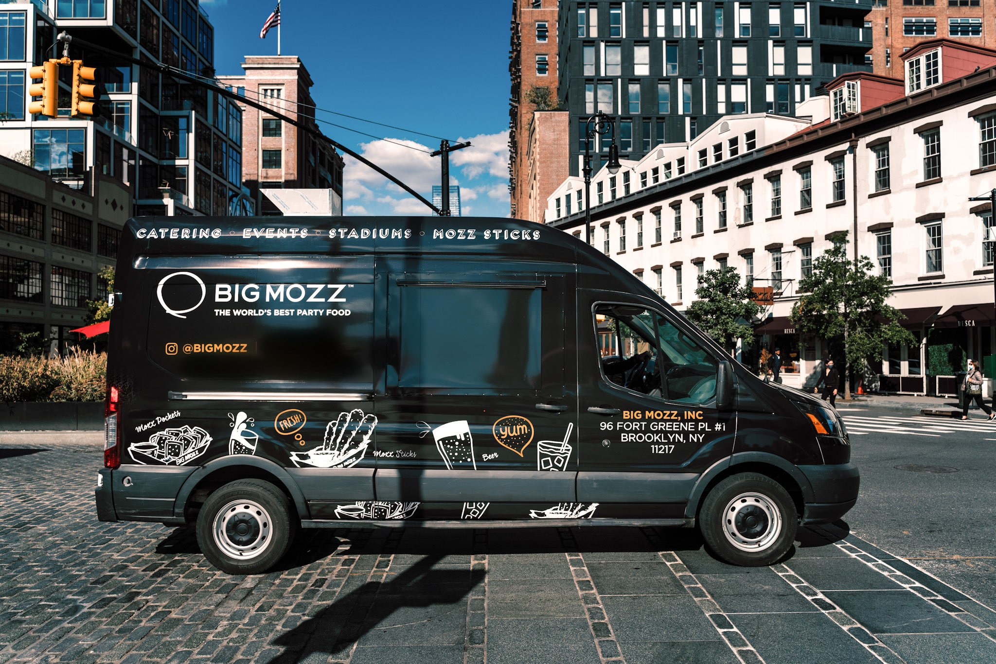 big mozz truck parked in jersey city on a sunny day