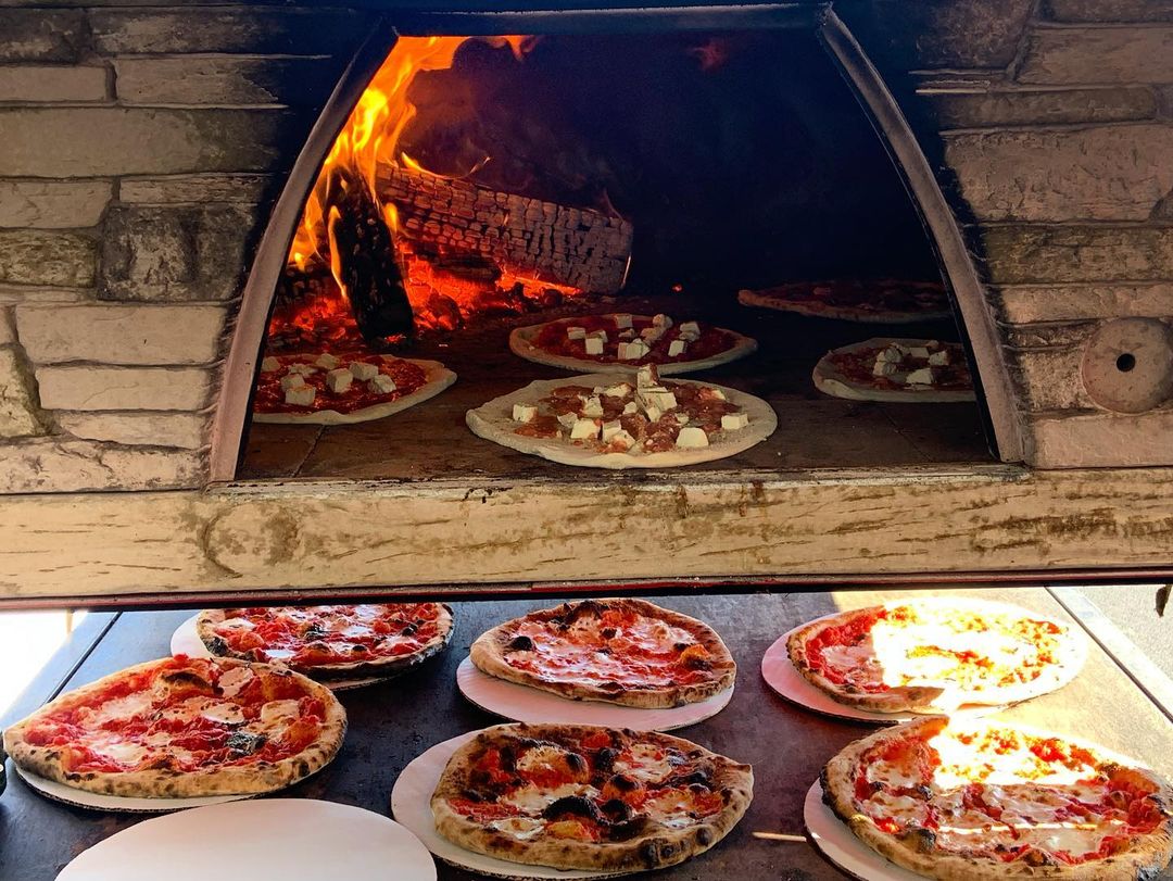 Wood fired pizzas from Pie Oh My pizza truck.