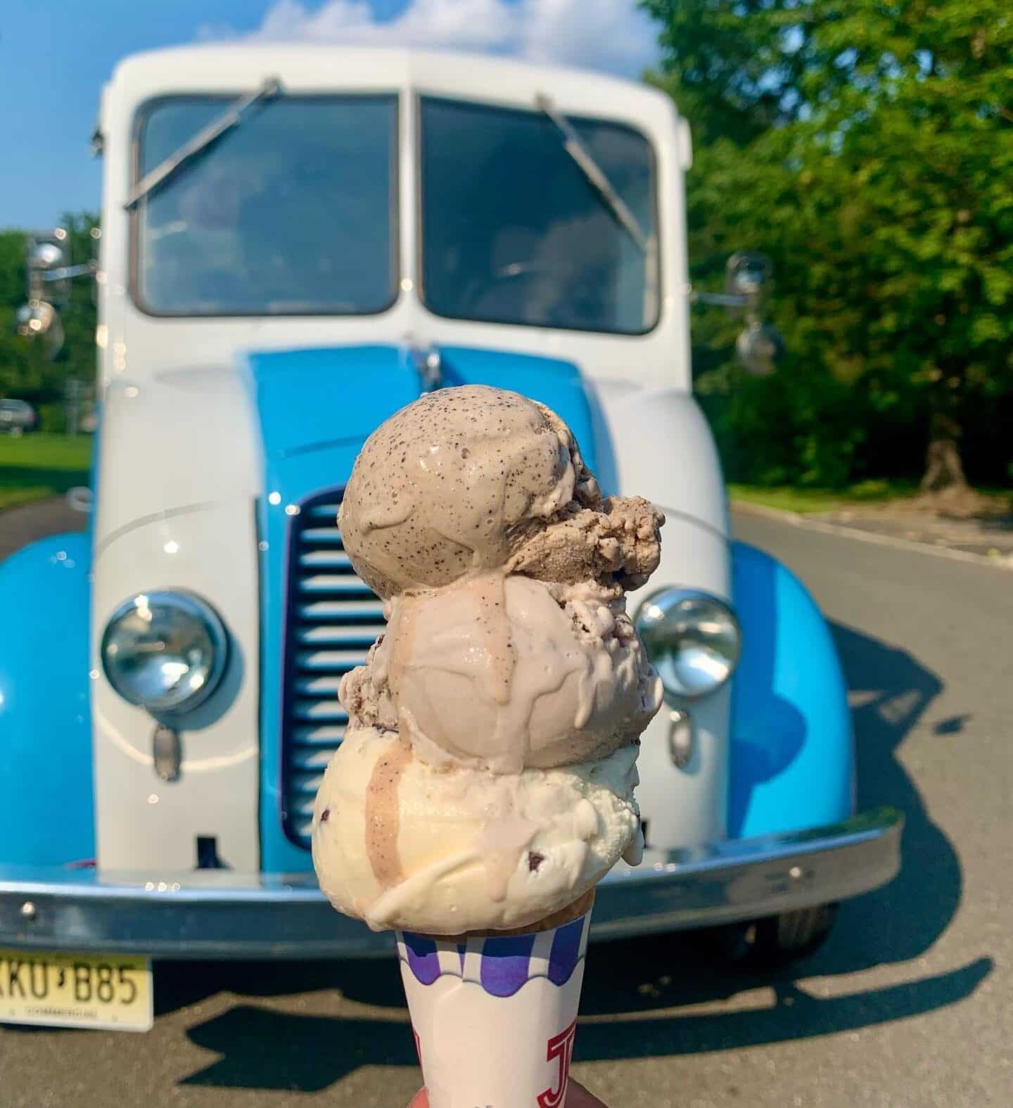 Ice cream cone in front of vintage truck