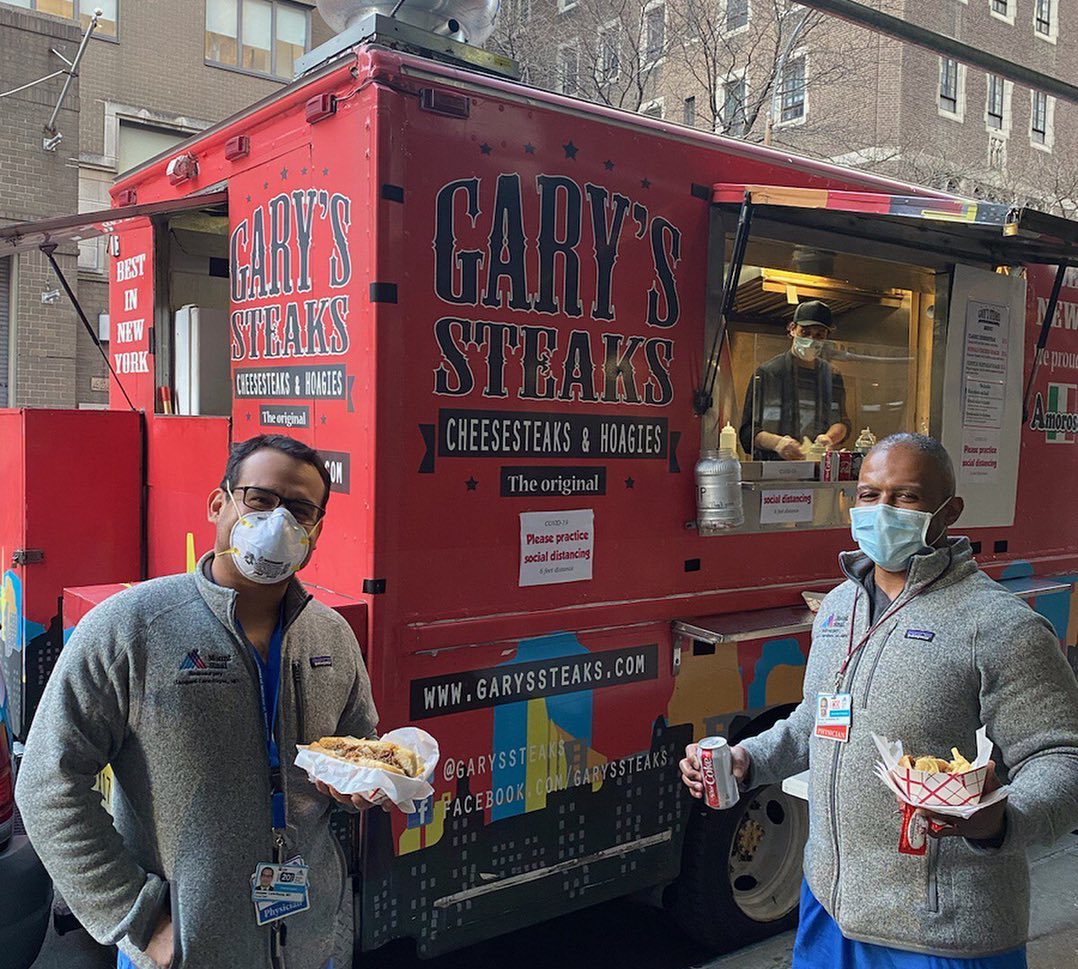 Nurses with food from Garys Steaks food truck