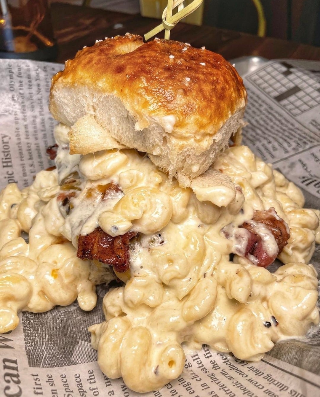 Cheese Burger topped with mac and cheese