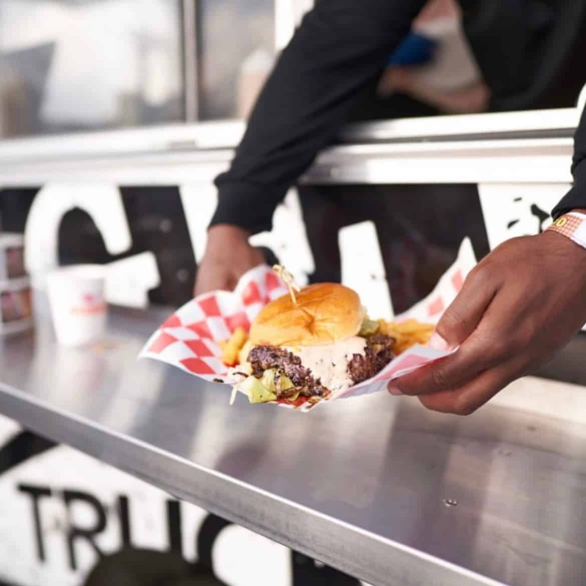 Burger being served from food truck