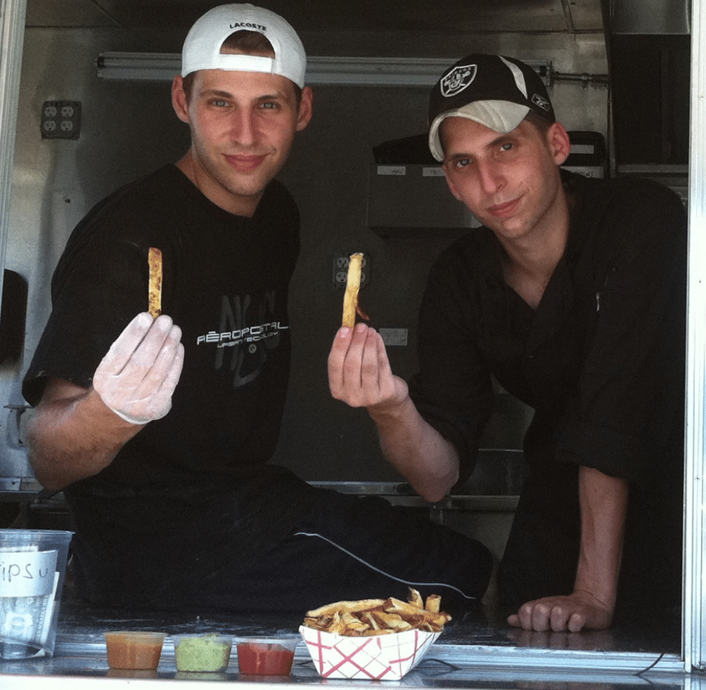 Ben Goldberg serving fries from the Frying Dutchman food truck