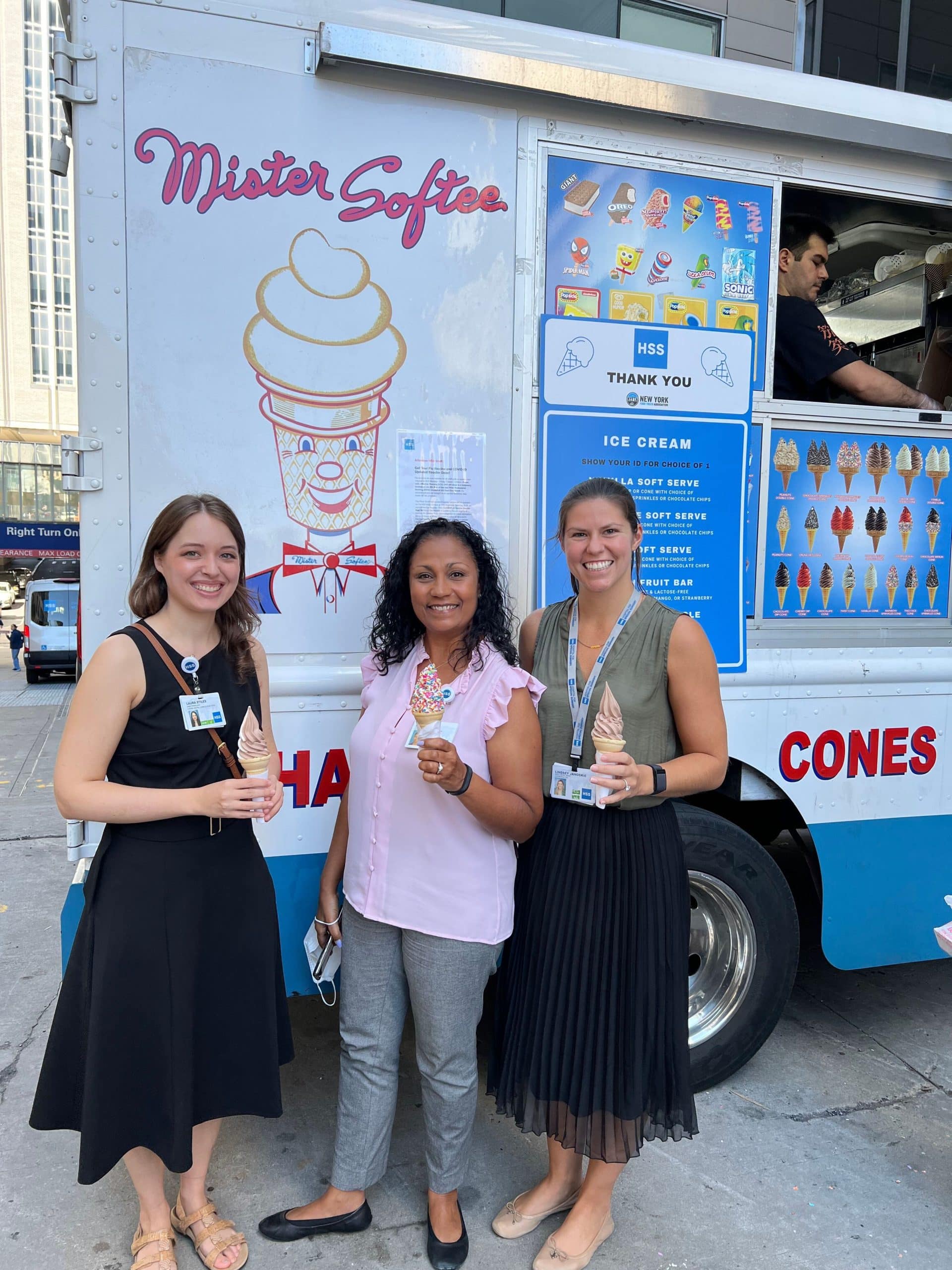 HSS employees with ice cream in front of Mister Softee ice cream truck