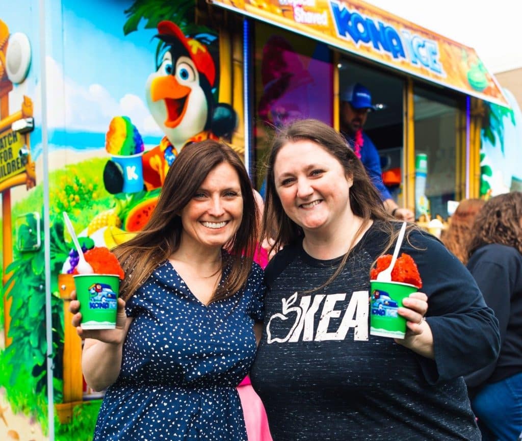 Guests enjoying shaved ice food truck at corporate event