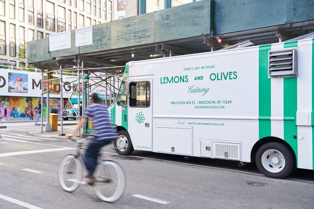 the Lemons and Olives food truck parked in manhattan.