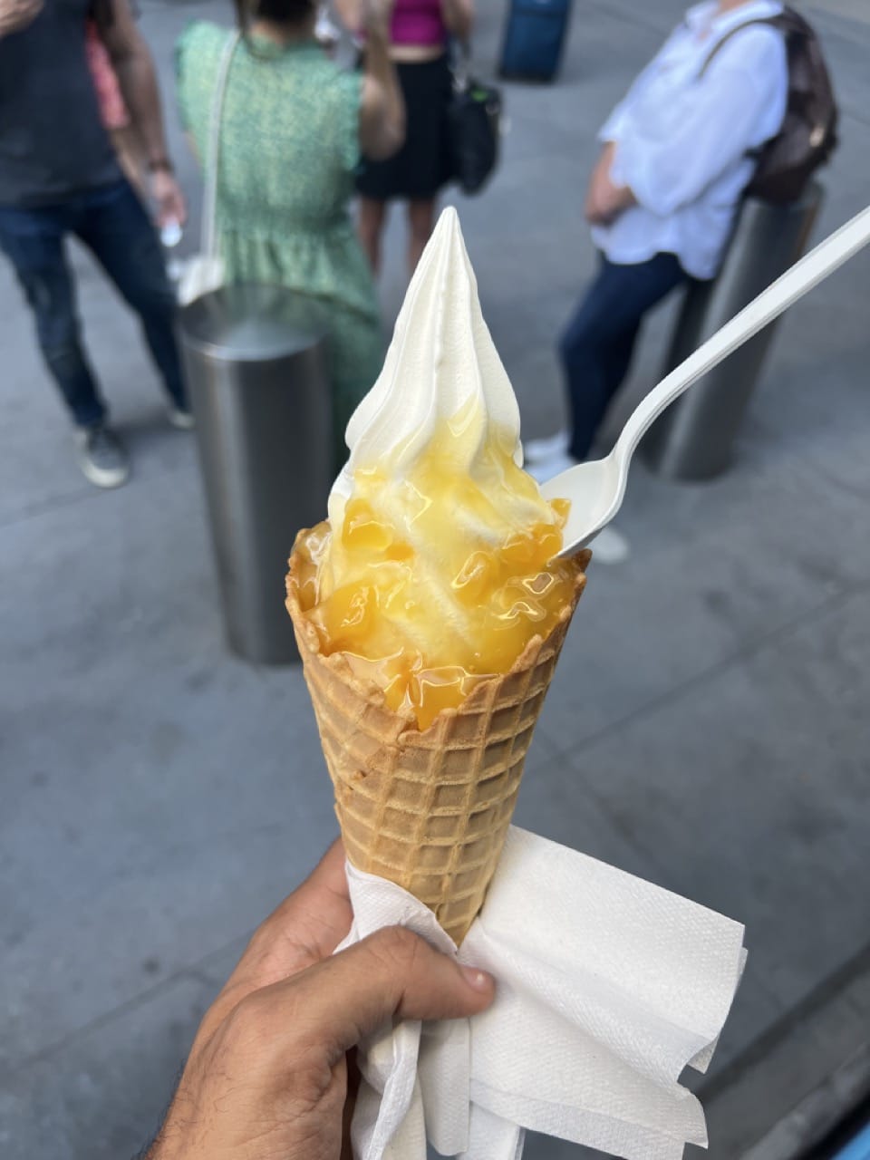 soft serve ice cream with mango in waffle cone sunrise delight